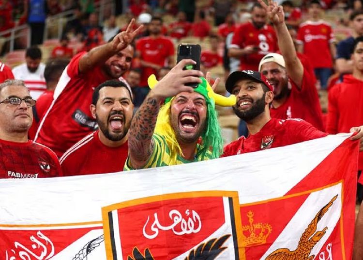 Al-Ahly's supporters cheer before the FIFA Club World Cup semi-final match against Fluminense.