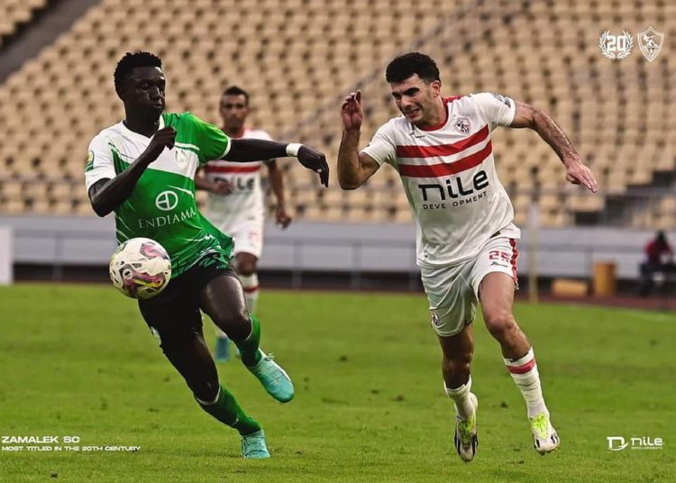 Zamalek’s winger Ahmed Sayed ‘Zizo’ (R) vies for the ball with Sagrada’s player during the fourth round of the CAF Confederation Cup in Luanda.
