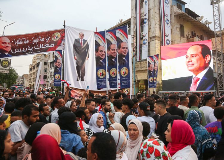Presidential polls to be held under guarantees, facilities for voters 1 - Egyptian Gazette CAIRO, EGYPT - OCTOBER 2: Supporters of Egyptian President Abdel Fattah al-Sisi gather in El Korba Square in Heliopolis neighborhood as they wait for his candidacy announcement in the presidential elections on October 2, 2023 in Cairo, Egypt. The presidential elections will be held over three days in December. (Ph oto by Islam Safwat/Getty Images)