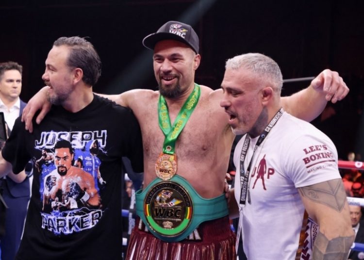 Joseph Parker celebrates with his team after winning his fight against Deontay Wilder.