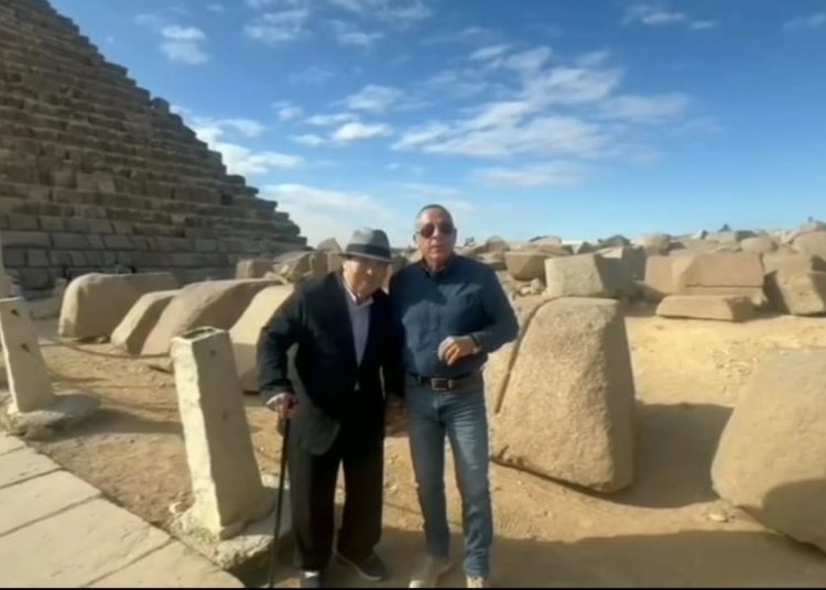 Dr Mostafa Waziry, secretary-general of the Supreme Council of Antiquities, and Japanese Egyptologist, Yoshimura Sakuji posing for a photo.
