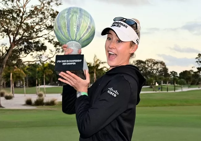 Korda storms to LPGA title 1 - Egyptian Gazette Nelly Korda poses with the trophy after winning the LPGA Drive Championship.