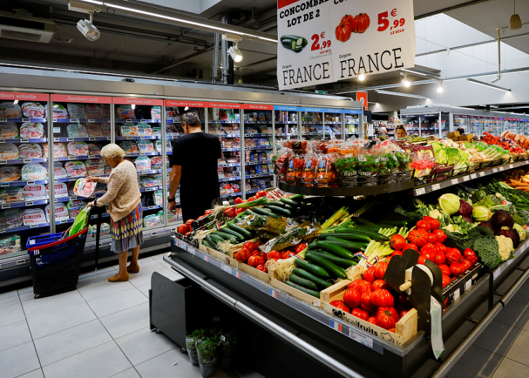 A file photo shows a customer shops in a supermarket in Nice, France, August 18, 2022.