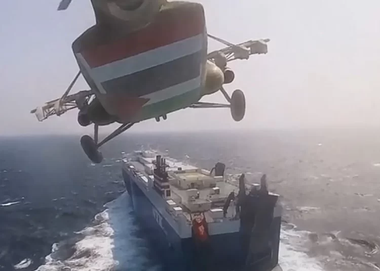 A screenshot captured from a video shows a cargo ship co-owned by an Israeli company being attacked by Iran-backed Houthis from Yemen in the Red Sea in November.