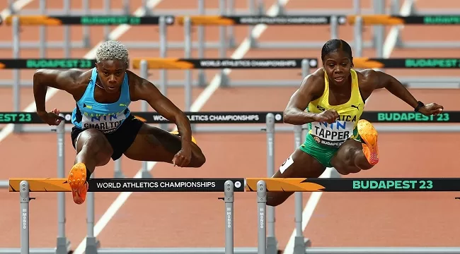 Charlton breaks world record 1 - Egyptian Gazette Devynne Charlton (L) and Jamaica's Megan Tapper in action during the World Athletics Championship in New York.