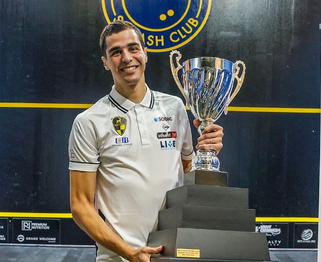 Ali Farag poses with the trophy after winning the 2024 Houston Men’s Squash Open.