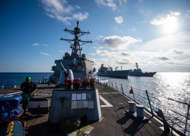 230703-N-OB471-1338 ATLANTIC OCEAN (July 3, 2023) The Arleigh Burke-class guided-missile destroyer USS Laboon (DDG 58) breaks away concluding a replenishment-at-sea July 3, 2023, in the Atlantic Ocean. This ship, as part of the Dwight D. Eisenhower Carrier Strike Group, is underway in the Atlantic Ocean participating in the Carrier Strike Group Four Composite Training Unit Exercise (COMPTUEX). COMPTUEX is an intense, multi-week exercise designed to fully integrate a carrier strike group as a cohesive, multi-mission fighting force and to test their ability to carry out sustained combat operations from the sea. (U.S. Navy photo by Mass Communication Specialist 2nd Class Jacob Hilgendorf)
