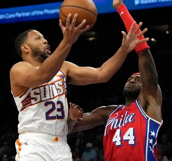 Los Angeles Clippers Ivica Zubac dunks over Portland Trail Blazers Deandre Ayton during their NBA basketball game in Portland.