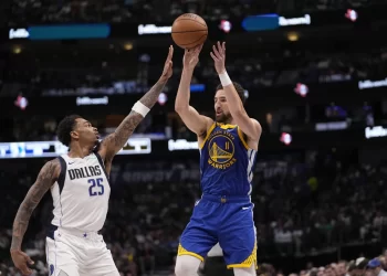 Mavs slog past Warriors 109-99