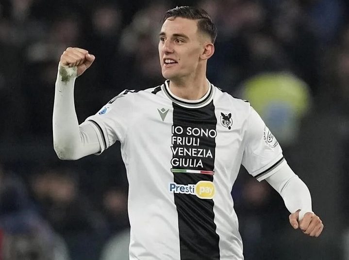 Udinese's Lorenzo Lucca celebrates after scoring his side's first goal during a Serie A match against Lazio.