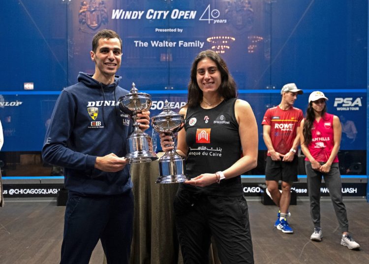 Ali Farag and Nour el-Sherbini pose with the Windy Squash Open titles.