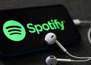 Spotify adds music videos to output