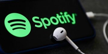 Spotify adds music videos to output