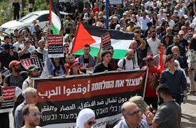 Palestinians march in West Bank to mark Land Day
