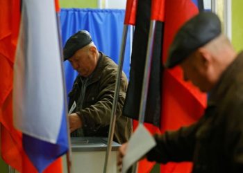 Ukraine strikes Russian city and refinery on day two of presidential vote