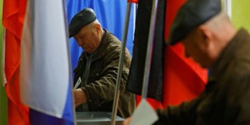 Ukraine strikes Russian city and refinery on day two of presidential vote