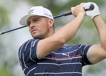Bryson storms into Masters lead