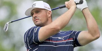 Bryson storms into Masters lead
