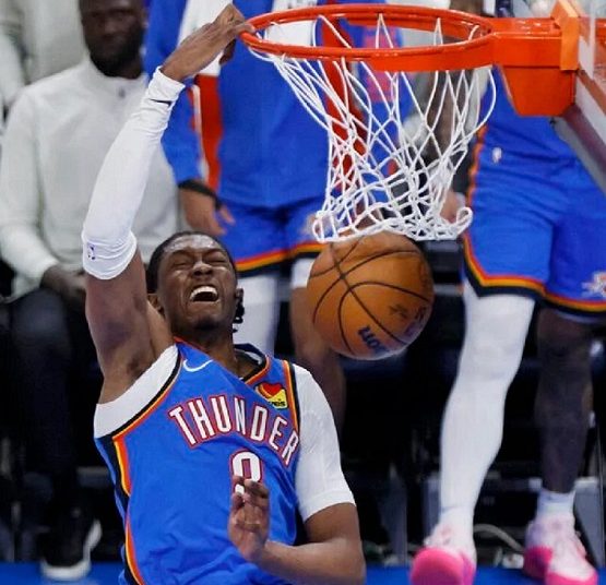 Oklahoma City Thunder Jalen Williams dunks against New Orleans Pelicans forward Brandon Ingram (not seen) during Game 2 of an NBA basketball first-round playoff series in Oklahoma City.