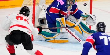 Canada downs Denmark at worlds