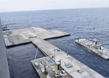Aid trucks begin moving ashore via Gaza pier
