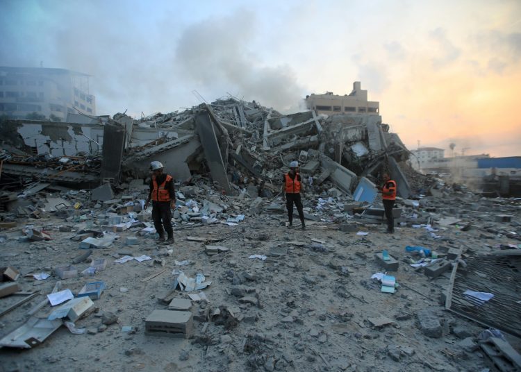 Israeli airstrike destroyed the 14-storey Watan Tower, a residential building that also included a number of press and commercial offices, in the Al-Rimal area in central Gaza City, October 8, 2023. Israeli colonial forces declared a "complete siege” on Gaza, denying the enclave’s millions of residents access to food, water and fuel and launched hundreds of airstrikes, killing hundreds and causing the displacement of tens of thousands of Palestinians. On the morning of October 7, the Palestinian resistance led by Hamas launched a surprise attack called the Al-Aqsa Flood operation. Dozens of resistance fighters raided Israeli settlements and thousands of rockets were launched from the Gaza Strip. At least 900 Israelis were killed and more than 100 are being held ass hostages by Hamas in Gaza.