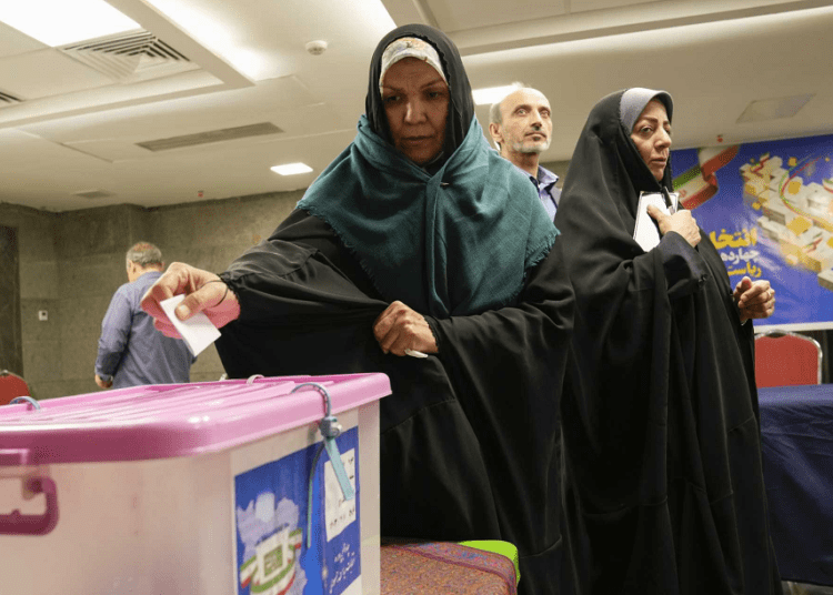 Presidential election kicks off in Iran 1 - Egyptian Gazette Iranian citizens cast their votes during the presidential election at a polling station inside the Iranian embassy in Baghdad, Iraq, Friday, June 28, 2024.