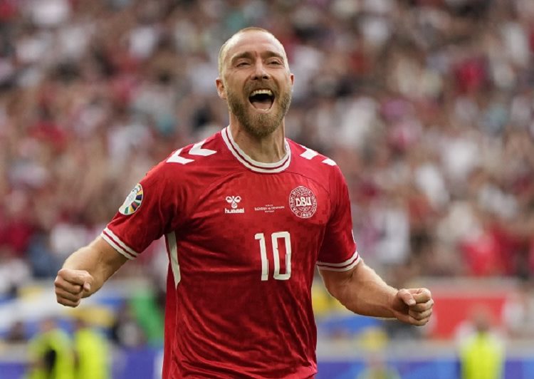 Denmark's Christian Eriksen celebrates after scoring the opening goal against Slovenia at the Euro 2024 in Stuttgart.