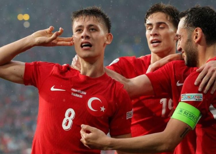 Turkey’s players celebrate after scoring against Georgia during their match at the Euro 2024 in Dortmund.