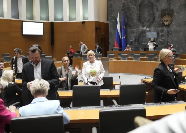 Members of the Slovenian Parliament leave the hall after their vote in Ljubljana, Slovenia, Tuesday, June 4, 2024. Slovenia recognized a Palestinian state on Tuesday after its parliament voted overwhelmingly in favor of the move, following in the recent steps of three other European countries.