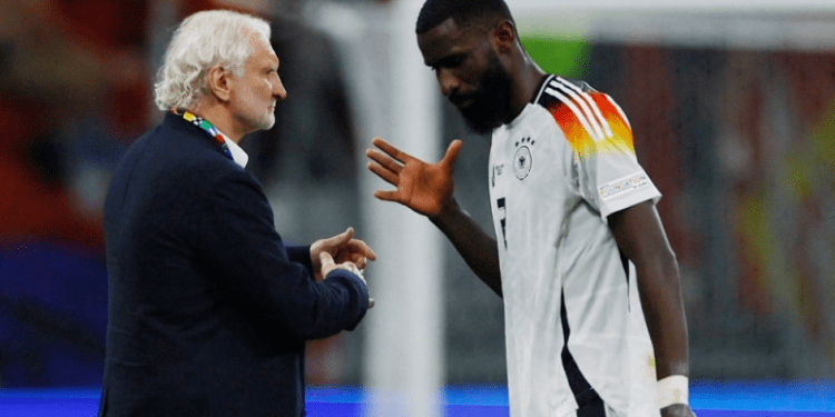 Germany’s Antonio Rudiger with DFB sporting director Rudi Voller after the match against Switzerland in Frankfurt, June 23, 2024.