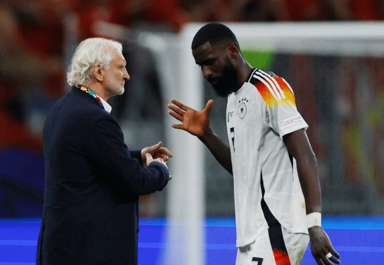 Euro 2024: Eriksen absent before Germany-Denmark clash 1 - Egyptian Gazette Germany’s Antonio Rudiger with DFB sporting director Rudi Voller after the match against Switzerland in Frankfurt, June 23, 2024.