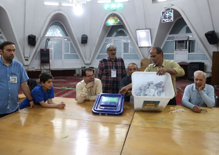 Iran’s presidential run-off will see hardline diplomat square off with sole moderate candidate 2 - Egyptian Gazette Iran’s presidential run-off will see hardline diplomat square off with sole moderate candidate 1 - Egyptian Gazette