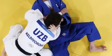 Defending champion Abe suffers defeat