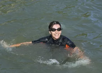 Paris mayor dips into the Seine River to showcase its improved cleanliness before Olympic events
