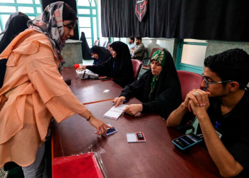 Polls open in Iran’s presidential election runoff