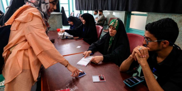Polls open in Iran’s presidential election runoff