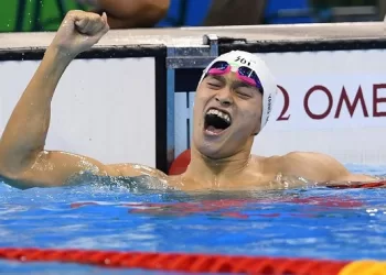 Yang wins on return from doping ban