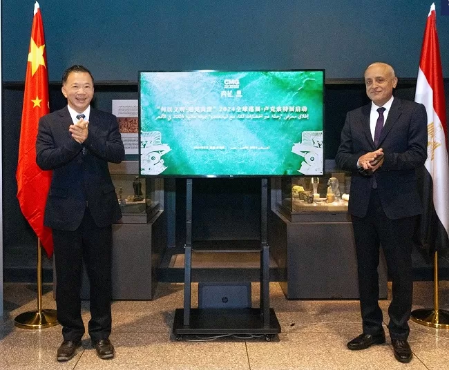 'Egyptian-Chinese relations deeply-rooted, longstanding' 1 - Egyptian Gazette Shen Haixiong (L), vice minister of the Publicity Department of the CPC Central Committee and president of CMG, and Abdel Moneim Emara, governor of Luxor, witness the launch of the special exhibition.