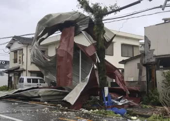 Strong storm lashes Japan with torrential rains and strong winds on its slow crawl north