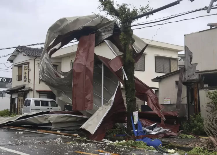 Strong storm lashes Japan with torrential rains and strong winds on its slow crawl north 1 - Egyptian Gazette