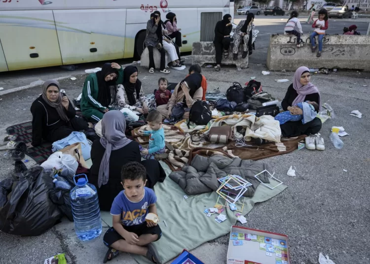 Hundreds of fleeing families sleep on beaches and streets after Israel’s strikes shake Beirut 2 - Egyptian Gazette Hundreds of fleeing families sleep on beaches and streets after Israel’s strikes shake Beirut 1 - Egyptian Gazette