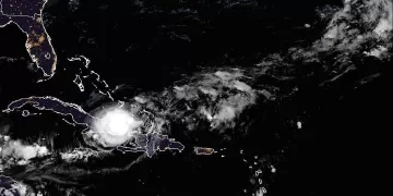 Tropical Storm Oscar dumps heavy rain on eastern Cuba as it heads towards the Bahamas