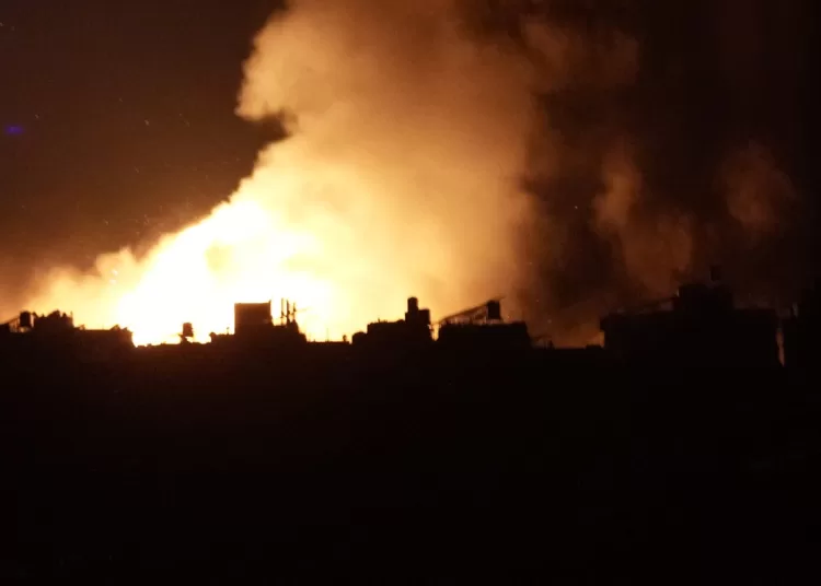 Flames and smoke rise from an Israeli airstrike in Dahiyeh, Beirut, Lebanon, early Sunday, Oct. 6, 2024. (AP Photo/Hussein Malla)