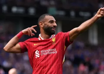 Salah strike sends Liverpool top