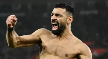 Salah shines as Liverpool extends lead