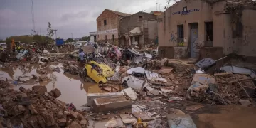 Heavy rains in Barcelona disrupt rail service as troops search for more flood victims in Valencia