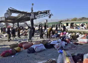 A powerful suicide bombing at a rail station in southwestern Pakistan kills at least 26