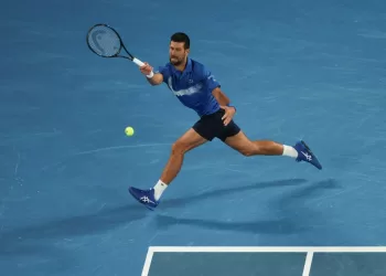 Djokovic breaks Federer’s Slam record with gritty Melbourne win