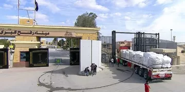 Relief aid trucks begin heading to Gaza as Hamas releases 3 Israeli female hostages